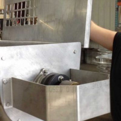 Custom food processing equipment for pie makers, for frozen food processors, for cheese manufacturers, auger conveyors, spiral let down chutes, stainless mixing screws, heated, chilled, thermoveyor, housing, perforated metal