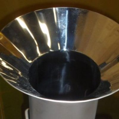 Custom food processing equipment for pie makers, for frozen food processors, for cheese manufacturers, auger conveyors, spiral let down chutes, stainless mixing screws, inlet cone, perforated metal