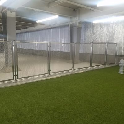 Stainless steel infill panel fence and screen for dog enclosure at Minneapolis St Paul Airport